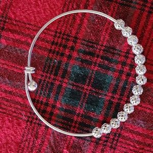 Stainless steel expandable bracelet